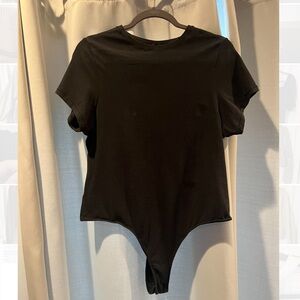 Skims Fits Everybody T-Shirt bodysuit (thong) in Black